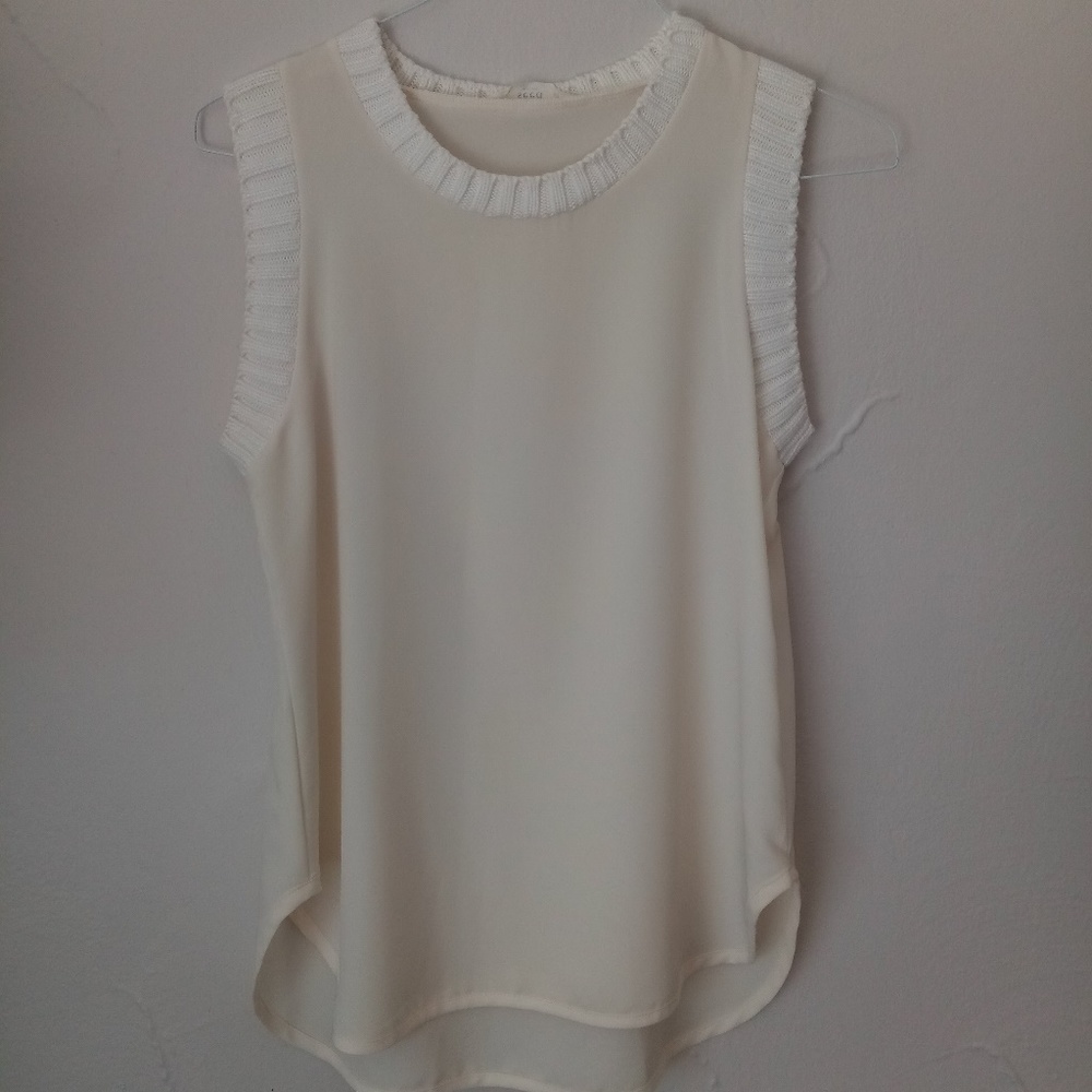Cream sleaveless blouse